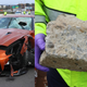 The Nissan GT-R and piece of concrete from the crash.